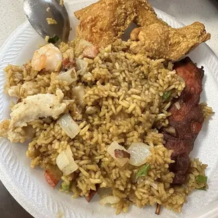 House fried rice (my favorite) with chicken wings and chicken on a stick (Chicken Teriyaki)