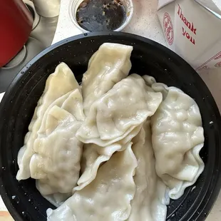 Dumplings w/ sauce