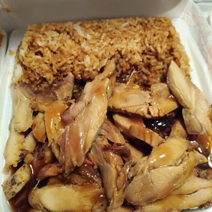 chicken and rice in a styrofoam container