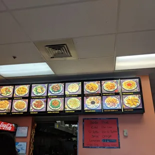 a restaurant with menus on the wall