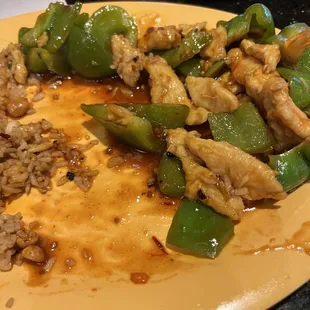 a plate of food with rice and vegetables