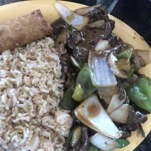 a plate of food with rice and vegetables