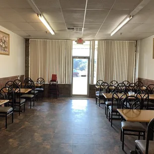 empty restaurant with tables and chairs