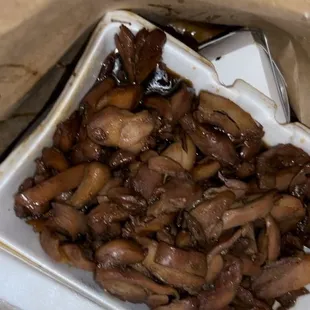 a plate of mushrooms on a table