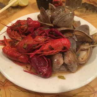 Crawfish boil and simmered clams.