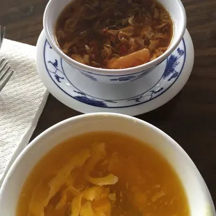 Hot sour soup in back egg drop in the front