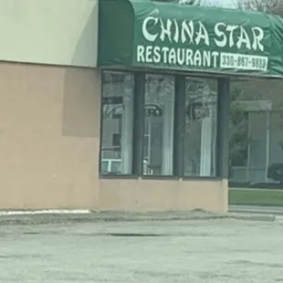 China Star has kids outside with food tongs picking up trash