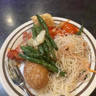 Green beans, sweet-and-sour chicken, rice noodles so many things on my plate and they were all fabulous!