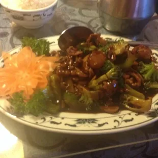a plate of chinese food on a table