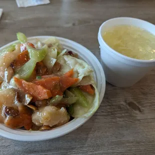 a bowl of food and a cup of soup