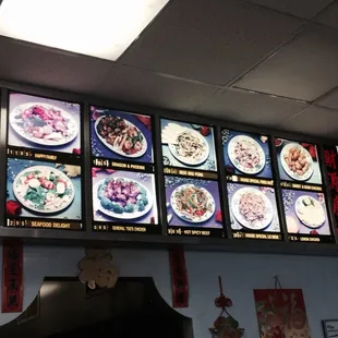 menus on a wall in a restaurant