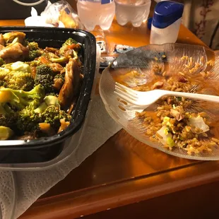 a plate of broccoli and a bowl of rice