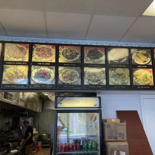 menus on the wall of a restaurant