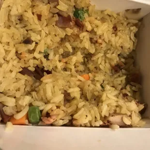 rice and vegetables in a take out box