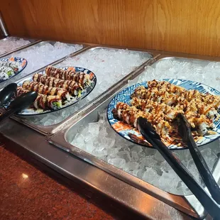 a variety of food items in a buffet