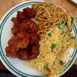 a plate of food with rice and meat