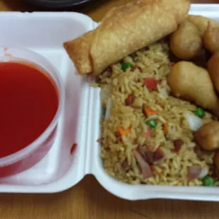 Sweet and sour pork, fried rice and egg roll. Yum.