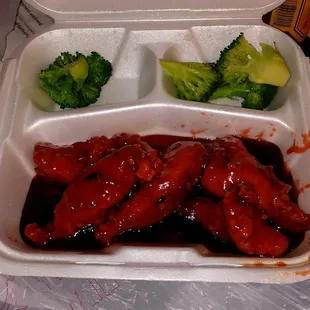 My very sad looking General Taos Chicken, practically no broccoli either. They're really stingy with the food.