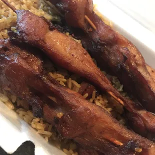 Chicken teriyaki on a stick with pork fried rice