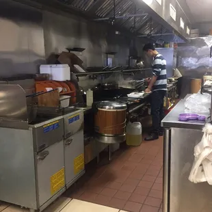 Orderly see-thru kitchen.