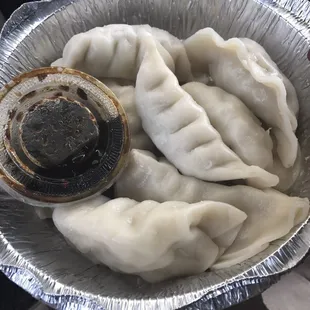 These dumplings were served undercooked and not hot at all tasted like pure dough