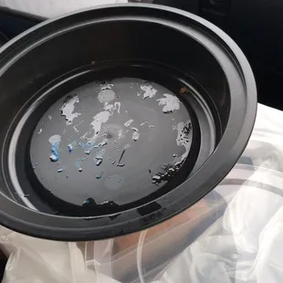 a dirty bowl in a car