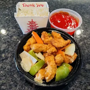 A dinner sized portion of the sweet and sour chicken