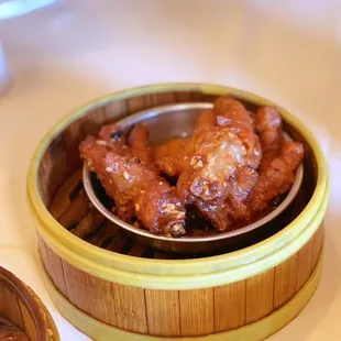a bowl of chicken wings