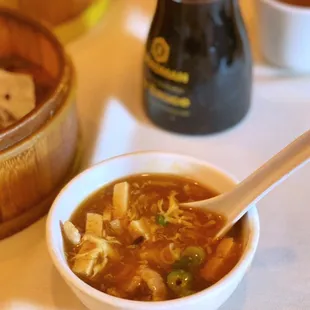 a bowl of soup with a spoon