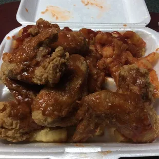 The wings with mumbo sauce and fries for $8, The food is good.
