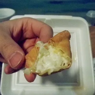 a person holding a pastry
