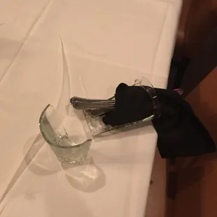 a knife and a glass on a table