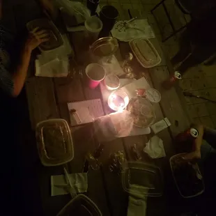 On the picnic table out back, by candlelight