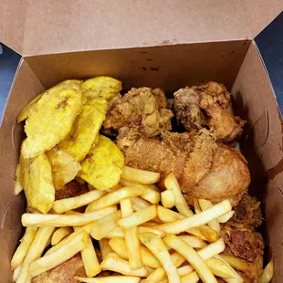 Fried chicken comes with French fries and plantains