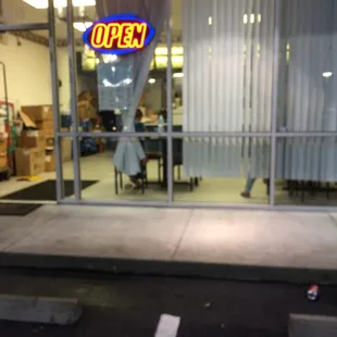 Standing next to my car waiting for the food to be ready