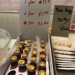 a display of tea and sauces