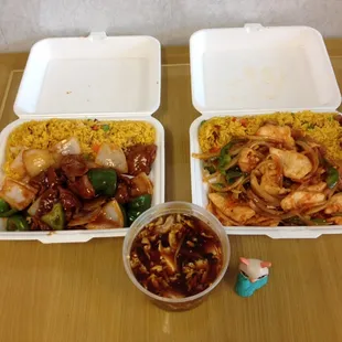 two take out containers of food
