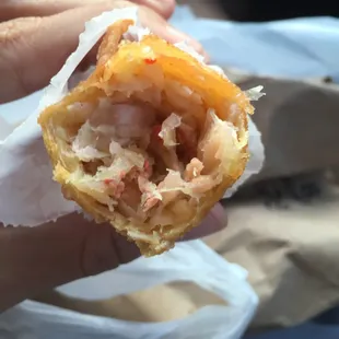 a person holding a pastry