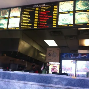 menus on the wall of a restaurant