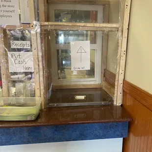 Order collection, notice the double window to isolate both parties.