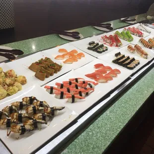 a variety of sushi and rolls