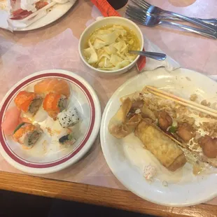 My plate(s) of the night. Egg drop soup, some reg. Sushi and spicy chicken w rice.