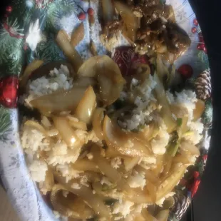 Rice and onions, a LITTLE bit of beef, for $12.50.. Threw $30 away.. Don't eat here..