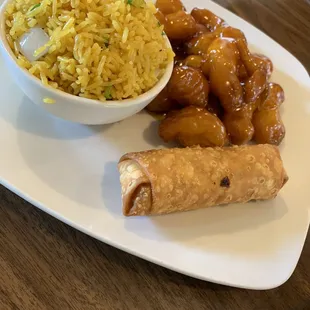 Honey chicken, egg roll, and pork fried rice.