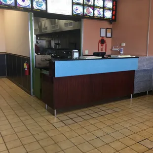 a view of a restaurant counter