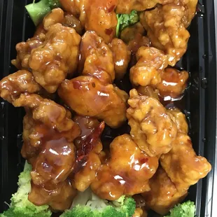 a tray of chicken and broccoli