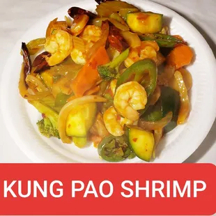 a plate of food with shrimp and vegetables