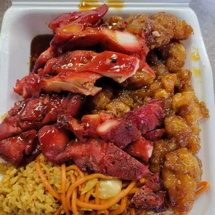 2 item plate  (teriyaki chicken &amp; orange chicken) with rice and chow mein. I already ate some pieces!