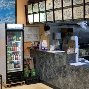 a view of a restaurant counter