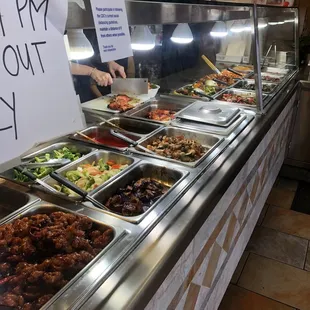 a buffet with many different types of food